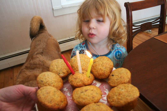 Bea celebrates 3 with a plate full of banana muffins for breakfast